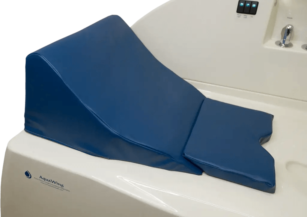 AquaWing Support Cushions for colon hydrotherapy treatment table, ergonomic medical positioning accessory.