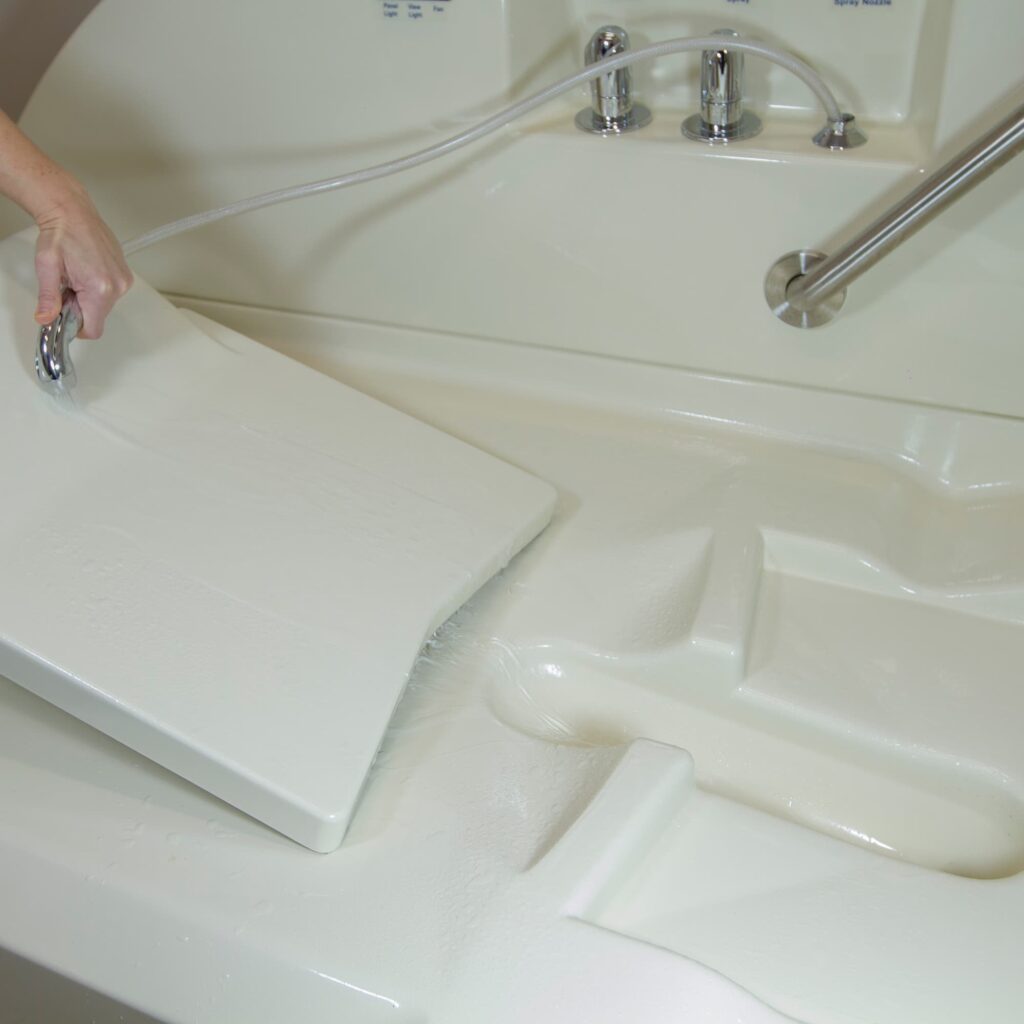 Cleaning AquaWing treatment table process for colon hydrotherapy system maintenance and sanitation.