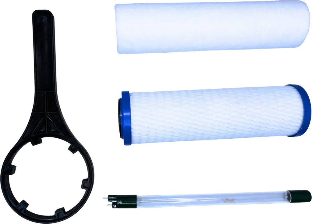Water filter components including a wrench, filter cartridges, and UV light.