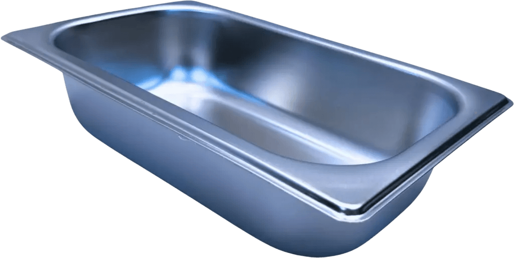 Stainless steel tray 4 for medical utensil storage and organization in clinical settings.